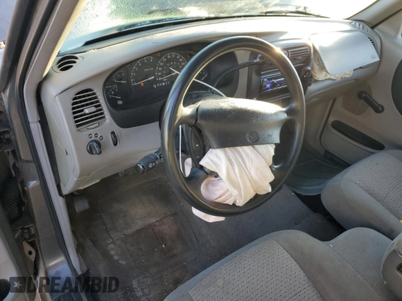 1999 Mazda B-Series 2WD Truck SE with VIN 4F4YR16V6XTM13090, listed as a Copart auction lot 88598745 with 202,722 mi miles and Salvage Title. Bid and sale history available at carsss.com. Image 8.