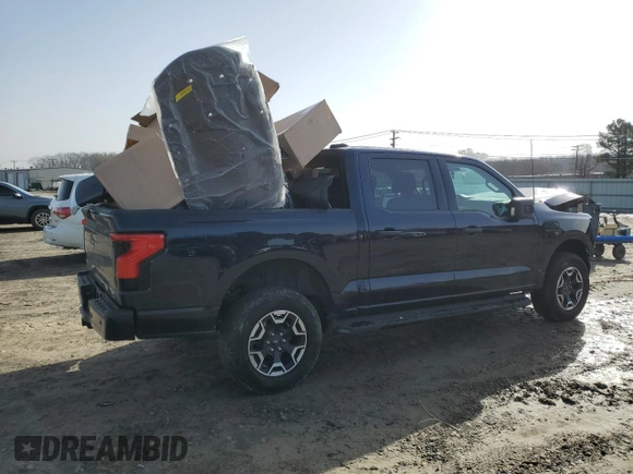 2022 Ford F-150 Lightning Pro с VIN 1FTVW1EL6NWG04931, выставлен на аукционе Copart как лот 43184675 с пробегом 26 616 миль миль и Списание • Salvage title. История ставок и продаж доступна на DreamBid. Изображение 3.