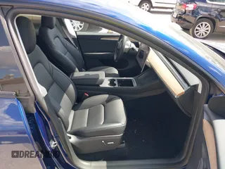 2023 Tesla Model Y Long Range with VIN 7SAYGDEE9PA205757, listed as a IAAI auction lot 41705881 with 18,567 mi miles and . Bid and sale history available at carsss.com. Image 5.