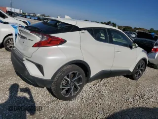 2019 Toyota C-HR XLE z VIN JTNKHMBX7K1014151, wystawiony jako Copart lot #50699475 z przebiegiem 102 995 mil mil oraz Czysty tytuł • Clean title. Historia ofert i sprzedaży dostępna na DreamBid. Obrazek 3.