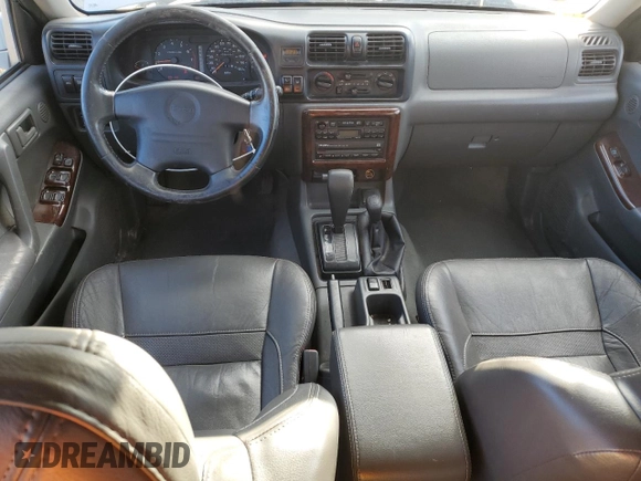 1999 Isuzu Rodeo S z VIN 4S2CM58W8X4339006, wystawiony jako Copart lot #84285294 z przebiegiem 129 191 mil mil oraz Czysty tytuł • Clean title. Historia ofert i sprzedaży dostępna na DreamBid. Obrazek 8.