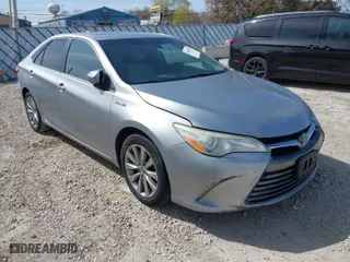 2015 Toyota Camry Hybrid LE with VIN 4T1BD1FKXFU159875, listed as a IAAI auction lot 42041323 with 240,779 mi miles. Bid and sale history available at carsss.com. Image 1.