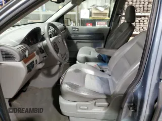 2004 Ford Freestar Limited z VIN 2FMDA58254BA54752, wystawiony jako Copart lot #89195235 z przebiegiem Nie podano mil oraz Szkoda całkowita • Salvage title. Historia ofert i sprzedaży dostępna na DreamBid. Obrazek 7.