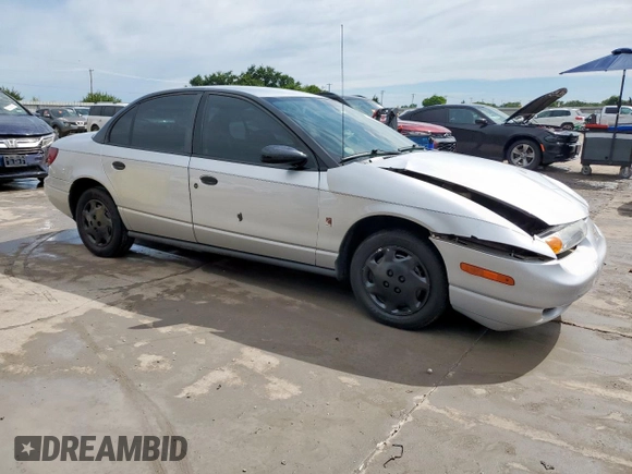 2002 Saturn SL с VIN 1G8ZH52892Z242469, выставлен на аукционе Copart как лот 59973755 с пробегом Не указан миль и Списание • Salvage title. История ставок и продаж доступна на DreamBid. Изображение 4.
