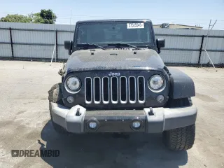 2017 Jeep Wrangler Unlimited Sahara with VIN 1C4BJWEG3HL614632, listed as a Copart auction lot 57525545 with 75,973 mi miles and Salvage title. Bid and sale history available at DreamBid. Image 5.