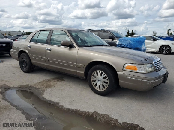 2003 Ford Crown Victoria LX with VIN 2FAHP74W63X124565, listed as a Copart auction lot 71051034 with 89,976 mi miles and Salvage Title. Bid and sale history available at carsss.com. Image 4.
