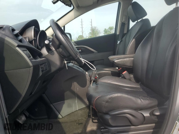 2014 Mazda 5 Grand Touring with VIN JM1CW2DL1E0165803, listed as a Copart auction lot 62914124 with 71,127 mi miles and Salvage Title. Bid and sale history available at DreamBid. Image 7.