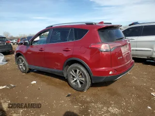 2018 Toyota RAV4 XLE with VIN 2T3RFREV0JW725903, listed as a Copart auction lot 48519955 with 55,056 mi miles and Salvage Title. Bid and sale history available at DreamBid. Image 2.