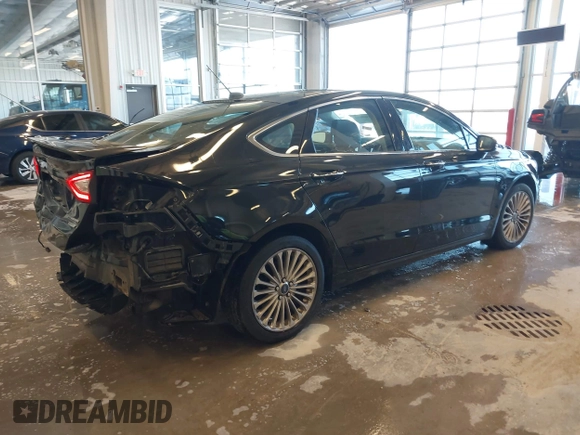 2014 Ford Fusion Titanium with VIN 3FA6P0K93ER115805, listed as a IAAI auction lot 41009602 with 136,021 mi miles. Bid and sale history available at carsss.com. Image 4.