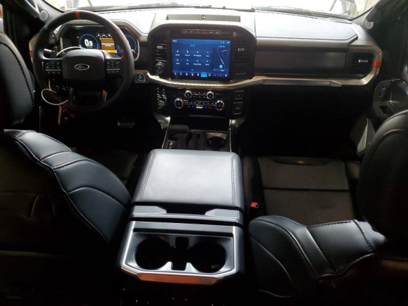 2023 Ford F-150 Raptor with VIN 1FTFW1RG5PFB97799, listed as a Copart auction lot 47471485 with 27,282 mi miles and Salvage Title. Bid and sale history available at DreamBid. Image 8.