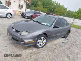 2002 Pontiac Sunfire SE z VIN 1G2JB524427245927, wystawiony jako IAAI lot #42346448 z przebiegiem 179 412 mil mil oraz . Historia ofert i sprzedaży dostępna na DreamBid. Obrazek 2.
