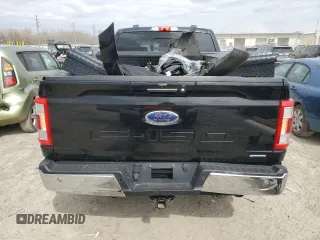 2021 Ford F-150 XL with VIN 1FTFW1E83MFB66545, listed as a Copart auction lot 49702825 with 84,078 mi miles and Salvage title. Bid and sale history available at DreamBid. Image 6.