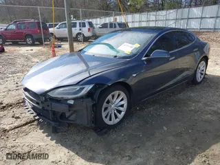 2017 Tesla Model S 100D with VIN 5YJSA1E23HF198592, listed as a IAAI auction lot 41721755 with 127,946 mi miles. Bid and sale history available at carsss.com. Image 2.