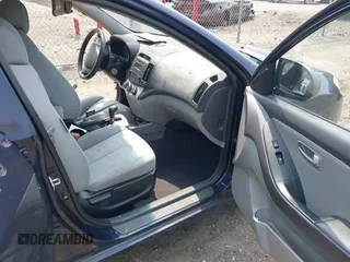 2009 Hyundai Elantra SE z VIN KMHDU46D99U597299, wystawiony jako IAAI lot #42395907 z przebiegiem 141 628 mil mil oraz . Historia ofert i sprzedaży dostępna na DreamBid. Obrazek 5.