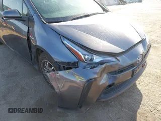 2022 Toyota Prius L Eco with VIN JTDKAMFUXN3188930, listed as a IAAI auction lot 42275661 with 116,934 mi miles and . Bid and sale history available at DreamBid. Image 6.