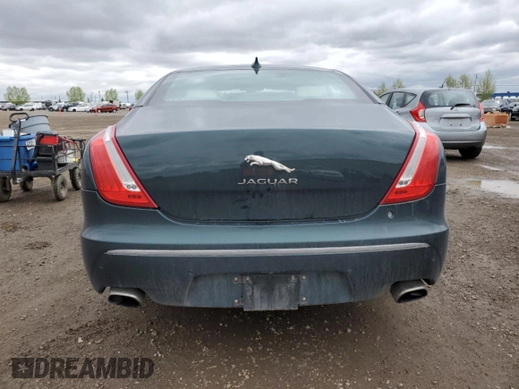 2015 Jaguar XJ Premium Luxury with VIN SAJXJ1CD3F8V88780, listed as a Copart auction lot 57488345 with 62,776 mi miles and Clean Title. Bid and sale history available at DreamBid. Image 6.