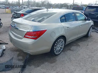 2014 Buick LaCrosse Premium II with VIN 1G4GF5G32EF129559, listed as a IAAI auction lot 41780260 with 120,487 mi miles and . Bid and sale history available at DreamBid. Image 4.