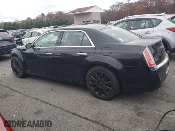 2012 Chrysler 300 C with VIN 2C3CCAKT9CH202809, listed as a Copart auction lot 79215864 with 121,610 mi miles and Salvage Title. Bid and sale history available at DreamBid. Image 2.