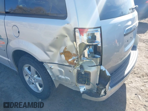 2010 Dodge Grand Caravan SXT with VIN 2D4RN5D19AR406197, listed as a IAAI auction lot 41854505 with 140,760 mi miles and . Bid and sale history available at DreamBid. Image 6.