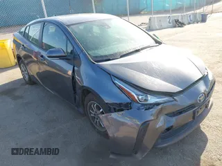 2022 Toyota Prius L Eco z VIN JTDKAMFUXN3188930, wystawiony jako IAAI lot #42275661 z przebiegiem 116 934 mil mil oraz . Historia ofert i sprzedaży dostępna na DreamBid. Obrazek 1.
