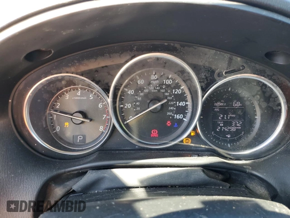 2014 Mazda CX-5 Grand Touring with VIN JM3KE4DY6E0363211, listed as a Copart auction lot 48352315 with 214,298 mi miles and Salvage Title. Bid and sale history available at DreamBid. Image 9.