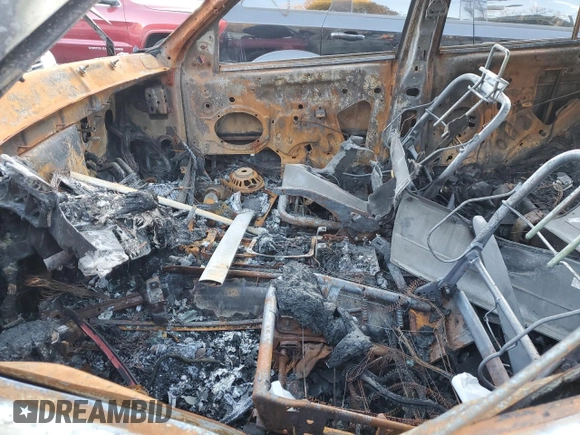 2002 Jeep Grand Cherokee z VIN 1J8GW38S72C159886, wystawiony jako Copart lot #77765704 z przebiegiem Nie podano mil oraz Szkoda całkowita • Salvage title. Historia ofert i sprzedaży dostępna na DreamBid. Obrazek 7.