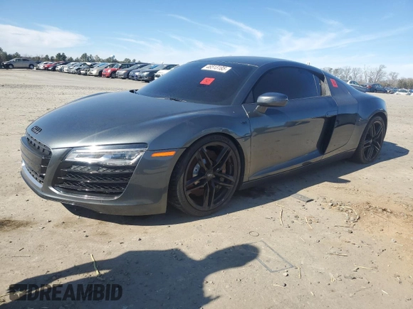 2014 Audi R8 z VIN WUAAUAFG0EN000936, wystawiony jako Copart lot #46513185 z przebiegiem Nie podano mil oraz Szkoda całkowita • Salvage title. Historia ofert i sprzedaży dostępna na DreamBid. Obrazek 1.