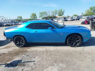 2015 Dodge Challenger SXT Plus with VIN 2C3CDZBG7FH901178, listed as a IAAI auction lot 42220878 with 123,146 mi miles and . Bid and sale history available at DreamBid. Image 13.