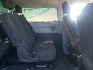 2016 Ford Transit Wagon XL with VIN 1FMZK1YM9GKB28861, listed as a Copart auction lot 77015814 with 111,384 mi miles and Salvage Title. Bid and sale history available at carsss.com. Image 11.