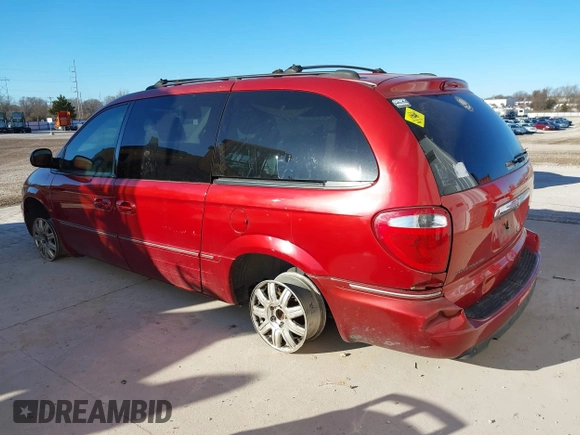 2005 Chrysler Town & Country Touring with VIN 2C8GP54L65R233842, listed as a IAAI auction lot 41682211 with 232,830 mi miles. Bid and sale history available at carsss.com. Image 3.