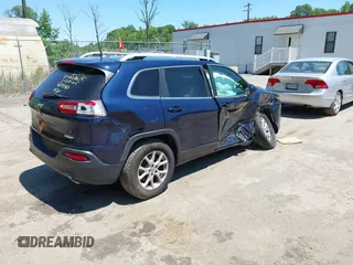 2016 Jeep Cherokee Latitude with VIN 1C4PJMCS5GW209340, listed as a IAAI auction lot 42401705 with 141,994 mi miles and . Bid and sale history available at DreamBid. Image 4.