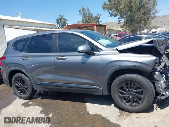 2019 Hyundai Santa Fe SE with VIN 5NMS23AD7KH009688, listed as a IAAI auction lot 41991686 with 77,942 mi miles and . Bid and sale history available at DreamBid. Image 14.