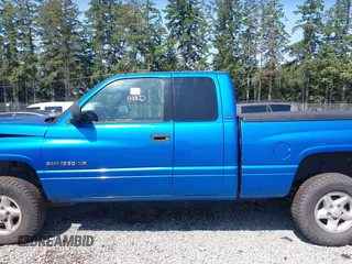 2001 Dodge 1500 z VIN 3B7HF13Z31M533735, wystawiony jako IAAI lot #42417352 z przebiegiem 184 487 mil mil oraz . Historia ofert i sprzedaży dostępna na DreamBid. Obrazek 15.