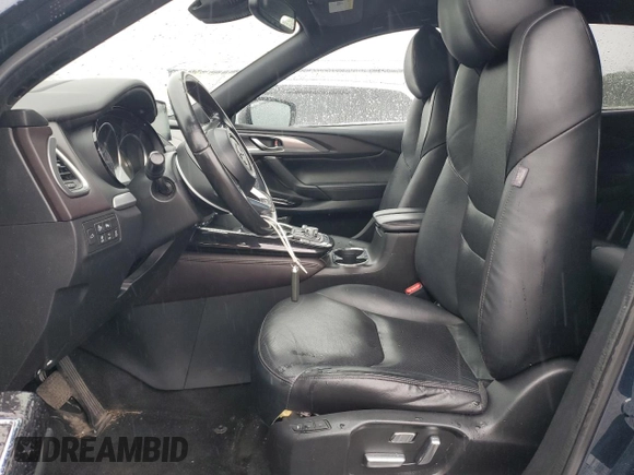 2017 Mazda CX-9 Grand Touring z VIN JM3TCBDY8H0131941, wystawiony jako Copart lot #56199685 z przebiegiem 166 080 mil mil oraz Szkoda całkowita • Salvage title. Historia ofert i sprzedaży dostępna na DreamBid. Obrazek 7.