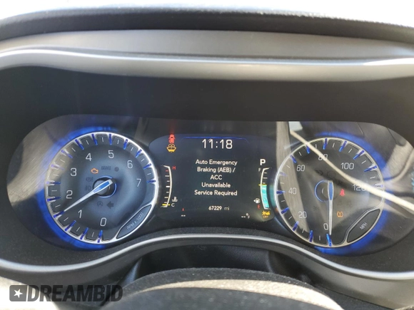2021 Chrysler Pacifica Touring L with VIN 2C4RC1BG1MR552939, listed as a Copart auction lot 45279645 with 67,229 mi miles and Salvage Title. Bid and sale history available at DreamBid. Image 9.