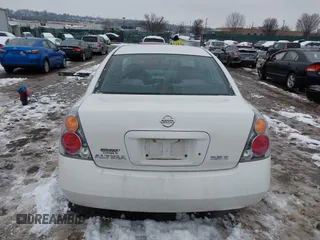 2004 Nissan Altima S with VIN 1N4AL11D64C137926, listed as a IAAI auction lot 41571445 with 124,147 mi miles. Bid and sale history available at carsss.com. Image 17.