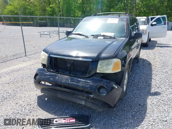 2007 GMC Envoy SLE with VIN 1GKDT13S372103718, listed as a IAAI auction lot 41886111 with 238,423 mi miles. Bid and sale history available at carsss.com. Image 6.