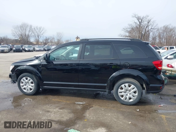 2019 Dodge Journey SE with VIN 3C4PDCBB8KT844800, listed as a IAAI auction lot 41721062 with 148,390 mi miles and . Bid and sale history available at DreamBid. Image 15.