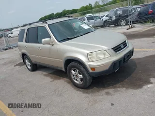 2001 Honda CR-V SE z VIN JHLRD187X1C052659, wystawiony jako IAAI lot #42383525 z przebiegiem 267 678 mil mil oraz . Historia ofert i sprzedaży dostępna na DreamBid. Obrazek 1.