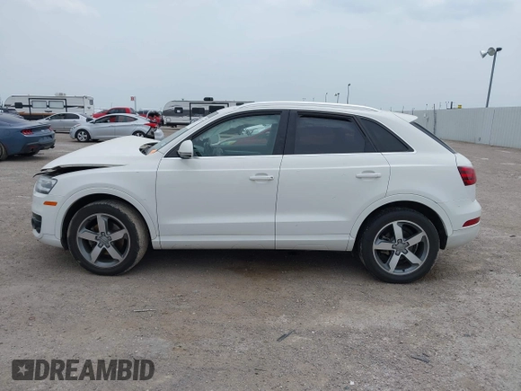 2015 Audi Q3 Premium Plus z VIN WA1EFCFS7FR006939, wystawiony jako IAAI lot #42067797 z przebiegiem 97 663 mil mil oraz . Historia ofert i sprzedaży dostępna na DreamBid. Obrazek 14.