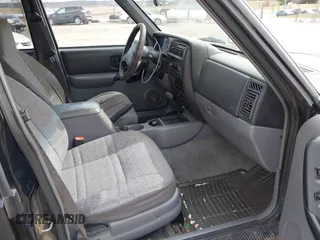 1998 Jeep Cherokee Sport with VIN 1J4FJ68S3WL285200, listed as a IAAI auction lot 41834529 with 335,881 mi miles and . Bid and sale history available at DreamBid. Image 5.