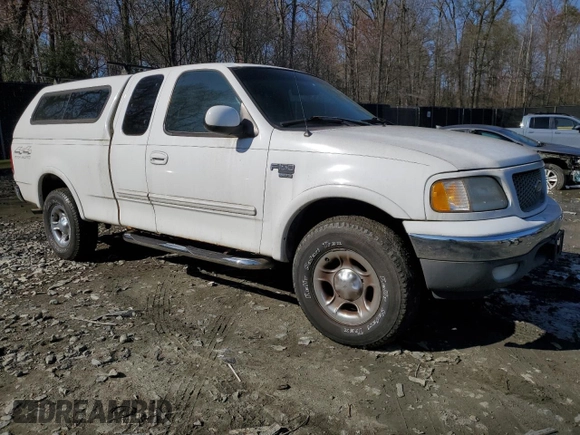 1999 Ford F-150 XL with VIN 1FTRX18L1XNB18305, listed as a Copart auction lot 51336985 with 173,904 mi miles and Clean Title. Bid and sale history available at carsss.com. Image 4.