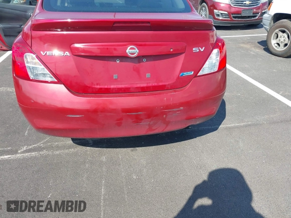 2013 Nissan Versa S Plus with VIN 3N1CN7AP2DL824175, listed as a IAAI auction lot 42834344 with 211,081 mi miles and . Bid and sale history available at DreamBid. Image 6.