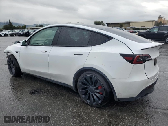 2022 Tesla Model Y Performance with VIN 7SAYGDEF3NF390848, listed as a Copart auction lot 49441025 with 42,488 mi miles and Salvage Title. Bid and sale history available at DreamBid. Image 2.