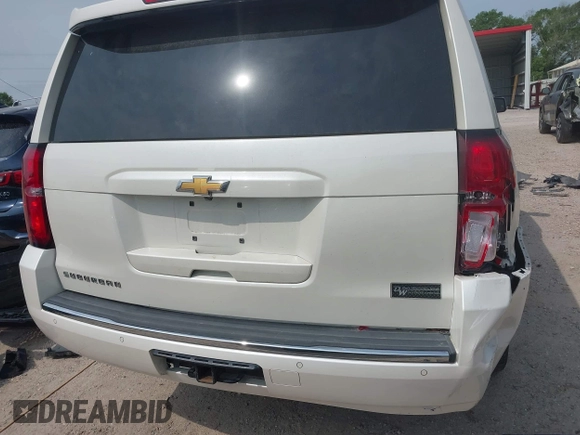 2015 Chevrolet Suburban LTZ with VIN 1GNSCKKC5FR740352, listed as a IAAI auction lot 39075234 with 112,945 mi miles and . Bid and sale history available at DreamBid. Image 17.