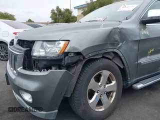 2013 Jeep Grand Cherokee Limited with VIN 1C4RJEBTXDC539433, listed as a IAAI auction lot 42046724 with 266,913 mi miles. Bid and sale history available at carsss.com. Image 6.