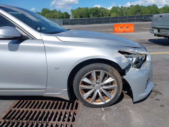 2014 Infiniti Q50 с VIN JN1BV7AP8EM691795, выставлен на аукционе IAAI как лот 42526313 с пробегом 112 407 миль миль и . История ставок и продаж доступна на DreamBid. Изображение 13.
