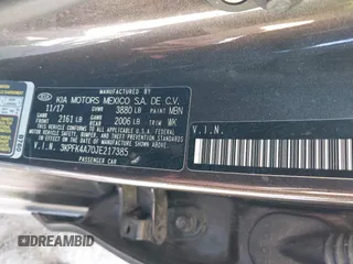 2018 Kia Forte LX with VIN 3KPFK4A70JE217385, listed as a IAAI auction lot 39955381 with 99,060 mi miles. Bid and sale history available at carsss.com. Image 9.