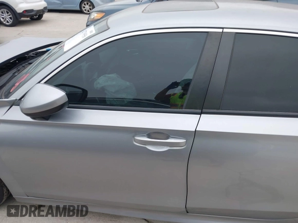 2023 Honda Civic EX with VIN 2HGFE1F77PH321210, listed as a IAAI auction lot 42379950 with Not provided miles and . Bid and sale history available at DreamBid. Image 14.