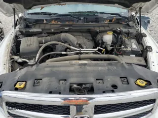 2019 Ram 1500 Tradesman z VIN 1C6RR7KT6KS647577, wystawiony jako Copart lot #51494075 z przebiegiem 128 156 mil mil oraz Czysty tytuł • Clean title. Historia ofert i sprzedaży dostępna na DreamBid. Obrazek 11.